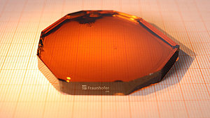 2-inch aluminum nitride crystal grown at the Fraunhofer IISB and PVA Tepla Joint Lab.