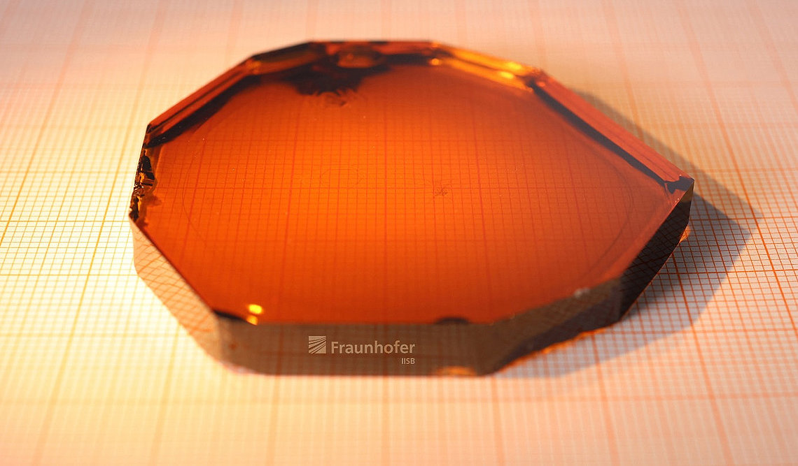 2-inch aluminum nitride crystal grown at the Fraunhofer IISB and PVA Tepla Joint Lab.