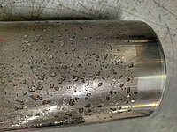 Bauteil mit Unterkorrosion an HVOF WC-Schicht